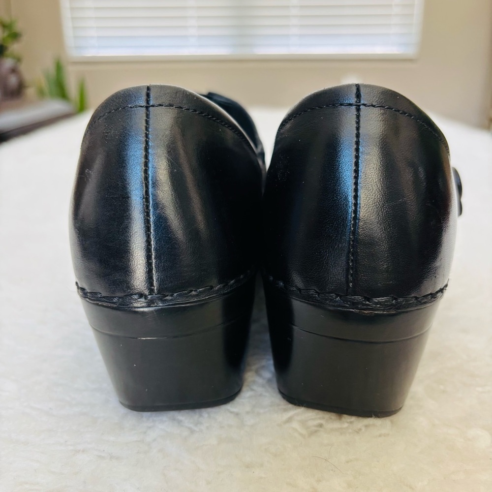 Dansko Black Leather Slip-On Clogs - Picture 11 of 13